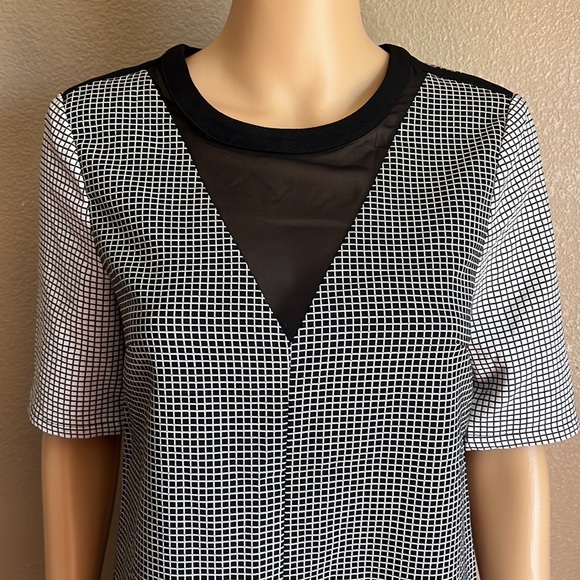 BCBGENERATION Black & White Checkered
Sheath Dress with Sheer V Neck Size XS - Picture 12 of 12